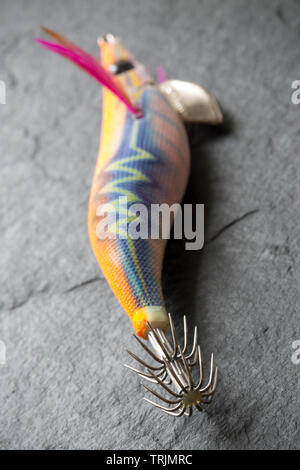 A Yamashita squid jig, or lure. Squid fishing has become popular in the UK both for commercial fishermen as well as recreational anglers. The lures ar Stock Photo