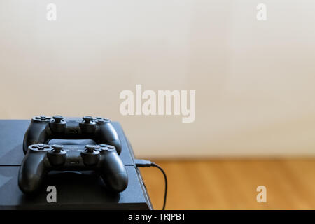 Two joysticks on table. Space for copy. Stock Photo