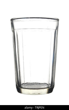 Empty faceted glass isolated on white background. Stock Photo