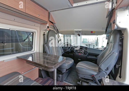Camping Van Cabin Interior With Turning Seats Stock Photo