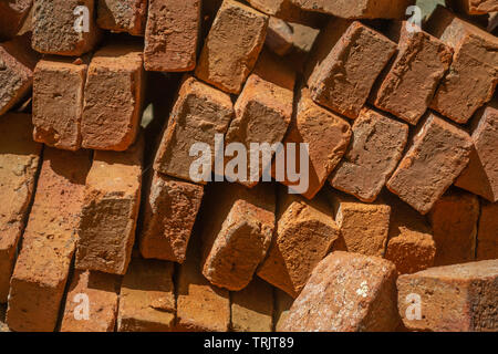 red brick in Thailand, many bricks are put in pile Stock Photo