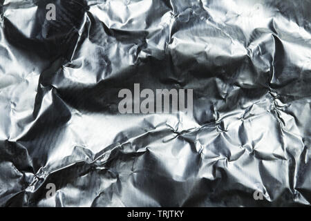 Background texture of crumpled aluminum foil Stock Photo