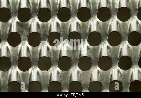 Closeup of a metal cheese grater Stock Photo