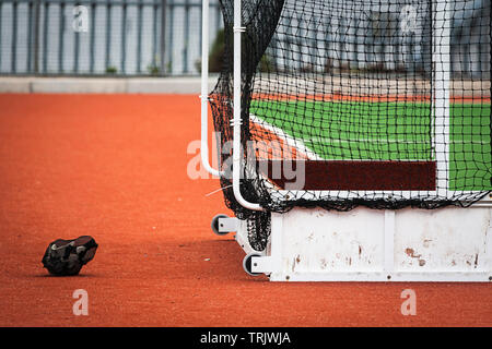 Goal box on astro hockey field with helmet in view. Stock Photo