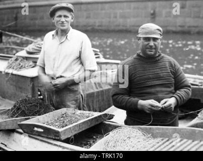 Copenhagen fishermen, Denmark, probably 1940s Stock Photo