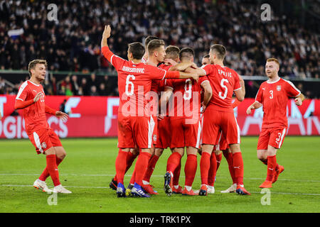 Wolfsburg, Germany, March 20, 2019: Serbian footballers celebrating a goal during the international friendly game Germany vs Serbia in Wolfsburg. Stock Photo