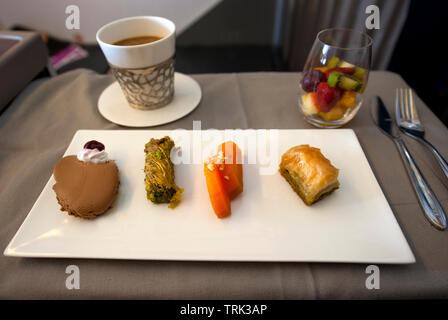 Dessert is part of gourmet food service in Business Class section of Turkish Airlines flight from Istanbul. Stock Photo