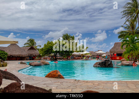 Tropical island resort swimming pool Stock Photo