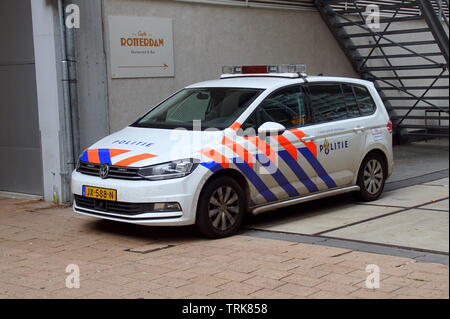 Rotterdam, the Netherlands - October 21, 2018:  Dutch national police car Volkswagen Touran parked by the side of the road. Nobody in the vehicle. Stock Photo