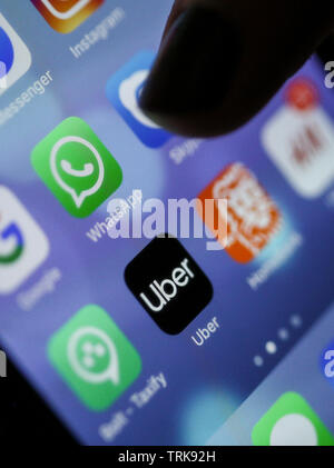 Bucharest, Romania - May 14, 2019: Macro image with various apps (Uber, Whatsapp) on a mobile device. Stock Photo