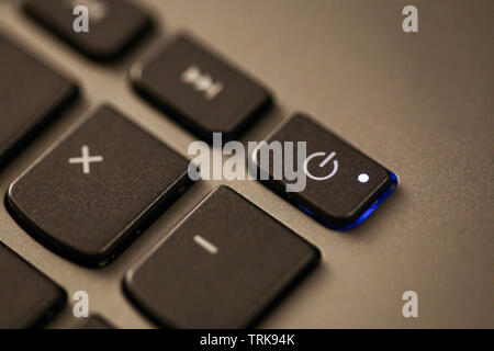Details with the Power ON/OFF button on a laptop/computer keyboard. Stock Photo