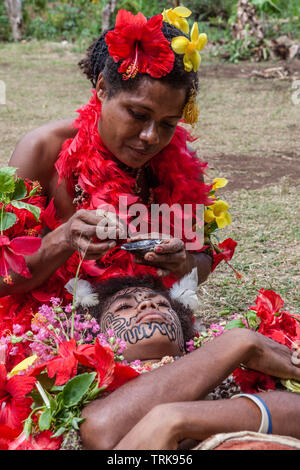 Demonstration of traditional Facial Tattoo, Tufi, Oro Province, Papua New Guinea Stock Photo