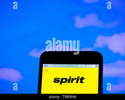 In this photo illustration the Spirit Airlines logo is seen displayed on a smartphone Stock Photo