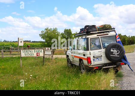 Yering, Australia - January 8, 2009: Off-road car standing near Yering Farm Wines fence. Victoria, Australia Stock Photo