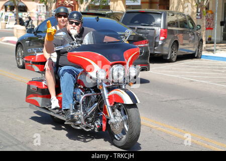 A biker riding along on his Harley Davidson motorbike in Boulder City, Nevada, USA Stock Photo