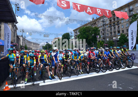 Group of cyclists standing in front of the start line. Cycle race among amateurs devoted to Day of Kiev. May 25, 2019. Kiev, Ukraine Stock Photo