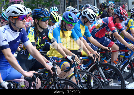 Group of cyclists standing in front of the start line. Cycle race among amateurs devoted to Day of Kiev. May 25, 2019. Kiev, Ukraine Stock Photo