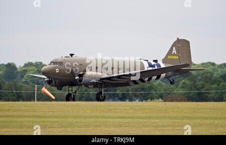 Douglas C-47A Dakota, 2100884, landing at Duxford after performing at the Daks over Normandy airshow on the 4th June 2019 commemorating D-Day Stock Photo