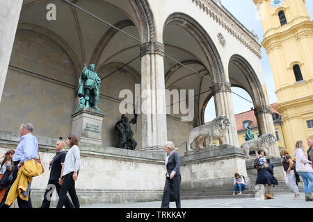 May 2019 - The Feldherrnhalle is a monumental loggia on the Odeonsplatz in Munich, modelled after the Loggia dei Lanzi in Florence, Munich, Germany Stock Photo
