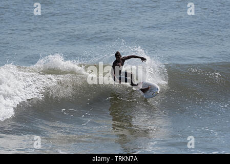 unidentified surfer on the pacific coast in panama Stock Photo