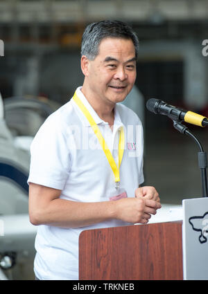 Leung Chun-ying , the Chief Executive of Hong Kong comes to see Cathay Pacific pilot Hank Cheng Chor-hang off on his adventure.Cheng built Inspiration Stock Photo