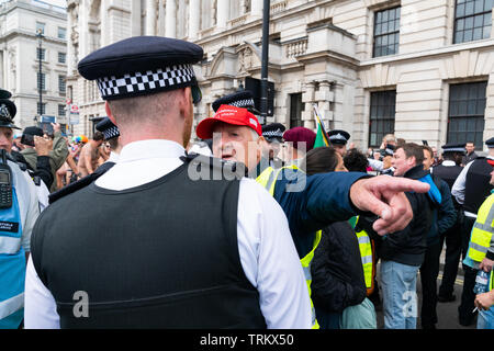 08 Jun 2019 -  London, UK. A group of angry nationalist protesters rally a protest outside Whitehall