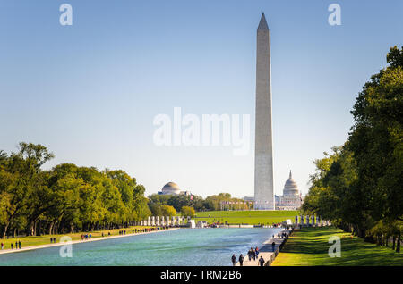 View of National Mall and Washington Monument under clear sky in Autumn. The Congess is visible in background. Washington DC, USA. Stock Photo