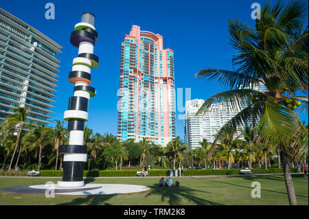 MIAMI - SEPTEMBER, 2018: Obstinate Lighthouse, an installation by German artist Tobias Rehberger, stands amidst the condo towers at South Pointe Park. Stock Photo