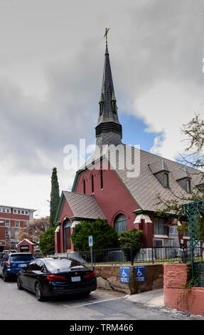 Bisbee, AZ/USA - 03-13-2019:  Front view of the historical brick church with distinctive spire in downtown Bisbee, AZ. Stock Photo