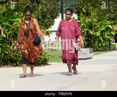 Candid portrait of two Melanesian women walking in a park, Port Vila, Efate Island, Vanuatu, Melanesia Stock Photo