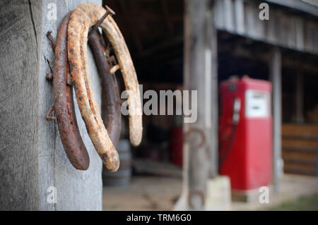 Horseshoes hanging outside a rural corner store. Stock Photo
