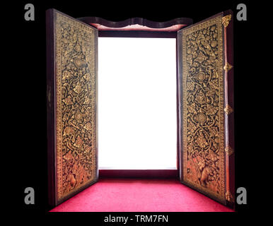 Open ancient golden pattern of wooden door, copy space on white background Stock Photo