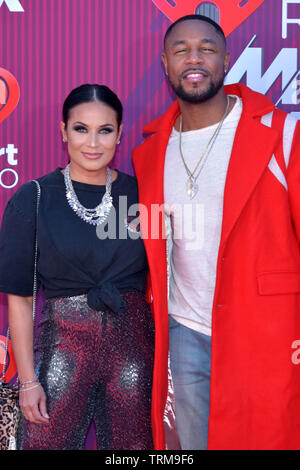 Zena Foster and Tank at the 2019 iHeartRadio Music Awards in Los Angeles on March 14, 2019 Stock Photo