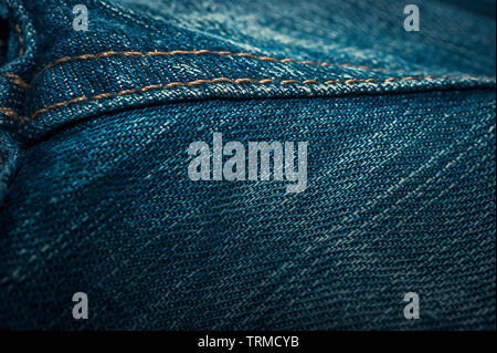 Closeup of Denim Jeans Double Stitched Seam. Denim Stitching Detail. Stock Photo