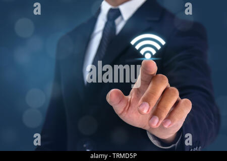 business man point hand to wifi 5g sign on Stock Photo