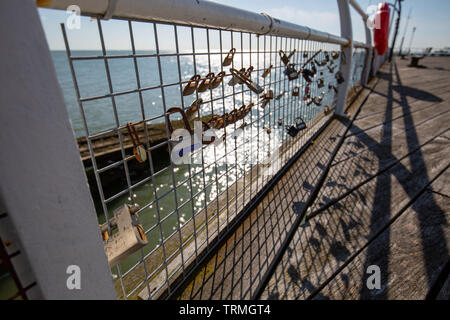 Lovers Padlocks on a Iron Fence Stock Photo