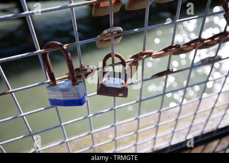 Lovers Padlocks on a Iron Fence Stock Photo