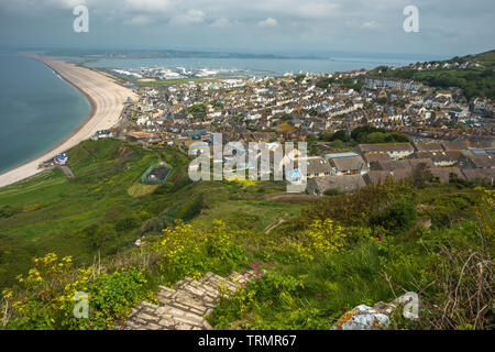 Elevated views from Portland heights on the Isle of Portland of Chesil Beach and the viilage of Fortuneswell, Dorset, England, UK, Europe Stock Photo