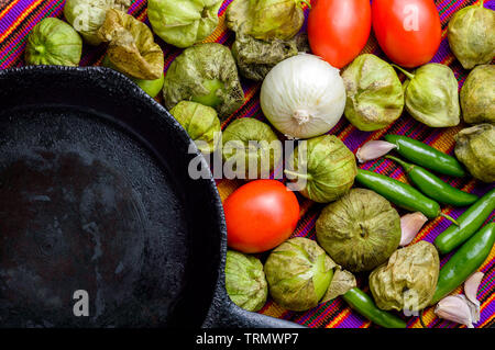 Ingredients for cooking Mexican green sauce, known as salsa verde, top down view with copy space Stock Photo