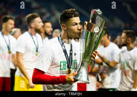 Cristiano Ronaldo of POR celebrates the victory and kisses the trophy Stock Photo