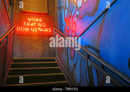 More Seating Downstairs Red Neon Sign, Brewdog Castlegate Bar, 5-9 Union St, Aberdeen, Scotland, UK,  AB11 5BU Stock Photo