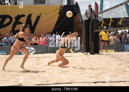 Sara Hughes/Summer Ross  competing against Taylor Nyquist/Tory Paranagua in the 2019 New York City Open Beach Volleyball Stock Photo