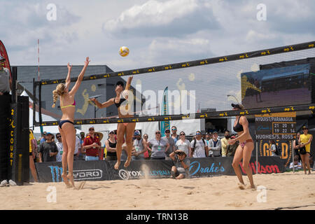 Sara Hughes/Summer Ross competing against Taylor Nyquist/Tory Paranagua in the 2019 New York City Open Beach Volleyball Stock Photo