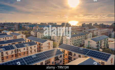 Solar PV  on the roof of the urban area Stock Photo