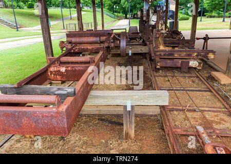 McDonough, Georgia / USA - June 9, 2019: A view of replicas of components of the saw mill at Miller's Mill in McDonough, GA. Stock Photo