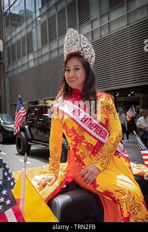 Mrs. Entrepreneur in a beautiful dress & tiara at the Vietnamese American Cultural Parade in Midtown Manhattan, New York City. Stock Photo