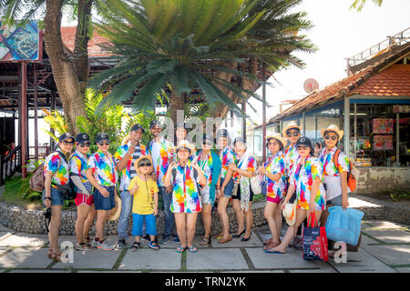 Monkey Island, Nha Trang City, Khanh Hoa Province, Vietnam - May 17, 2019: Tourists with colorful summer outfits are excited to enjoy their holiday on Stock Photo