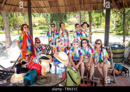 Monkey Island, Nha Trang City, Khanh Hoa Province, Vietnam - May 17, 2019: Tourists with colorful summer outfits are excited to enjoy their holiday on Stock Photo