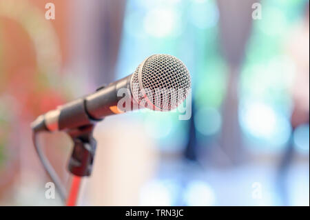 communication microphone on stage against a background of auditorium Concert stage Stock Photo