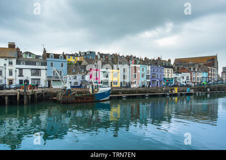 Weymouth Harbour (or the Old Harbour) a picturesque harbour with 17th-century waterfront at seaside town Weymouth in Dorset, southern England. UK. Stock Photo